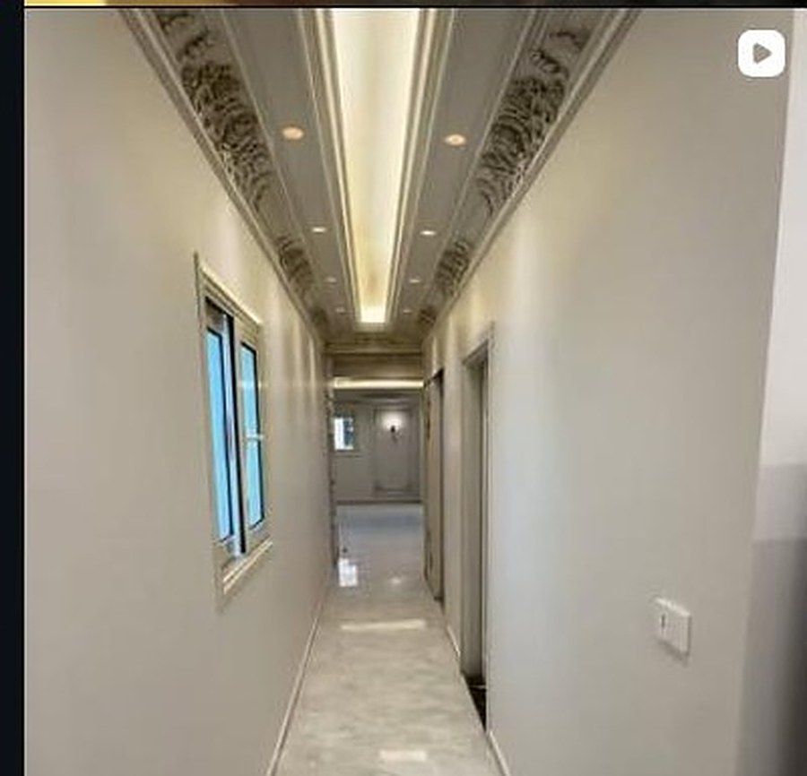 Hallway with decorative gypsum ceiling